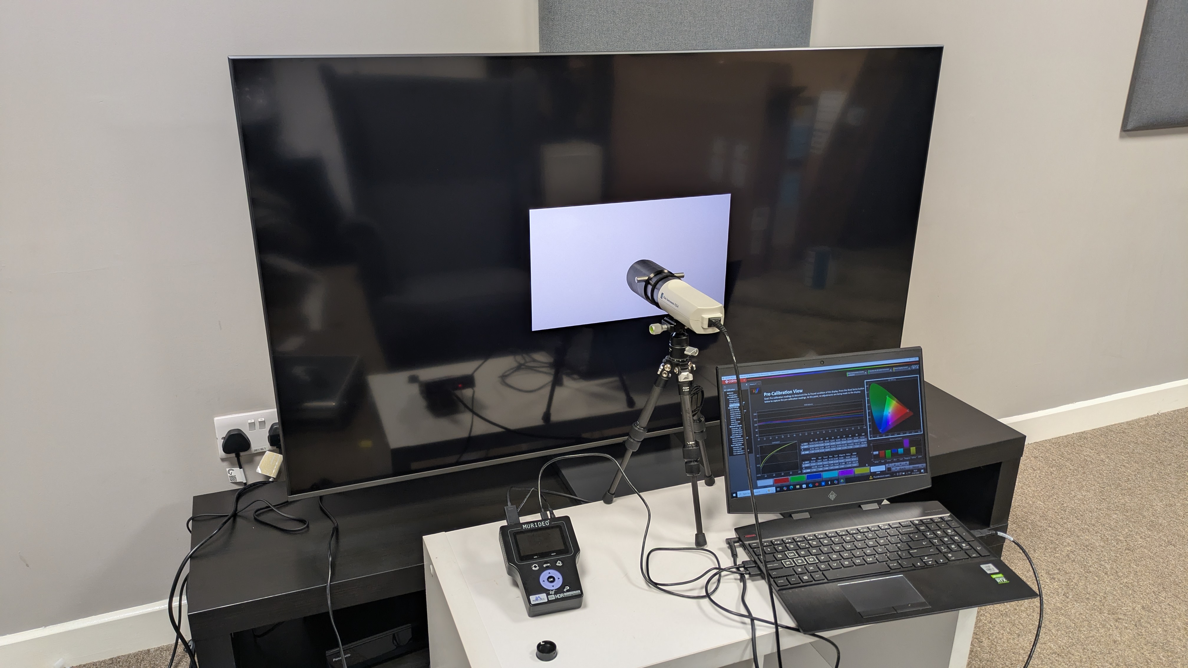 Samsung QN80F with testing equipment attached 