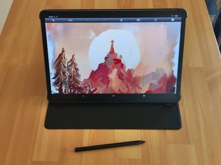 Ugee UT3 review; a drawing display on a wooden table