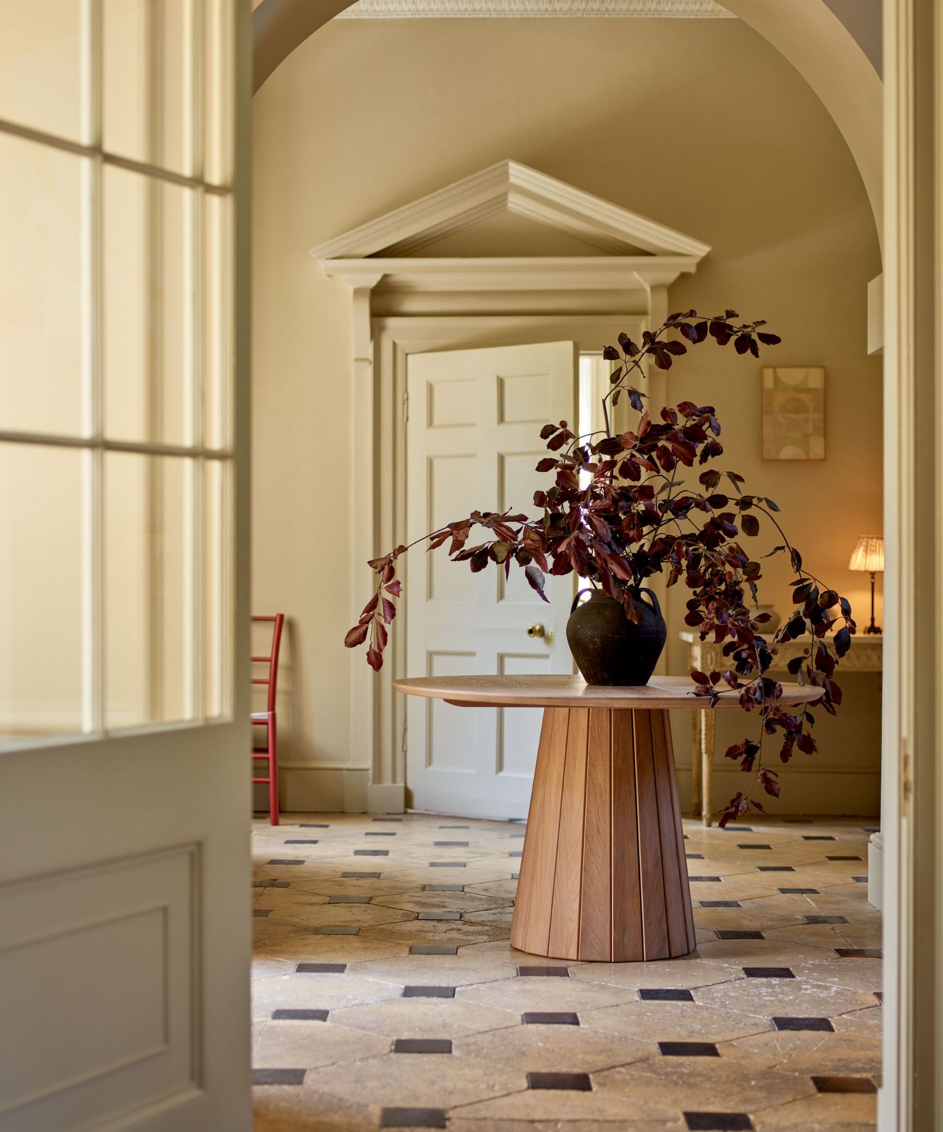 neptune tiled grand entryway foyer with round table