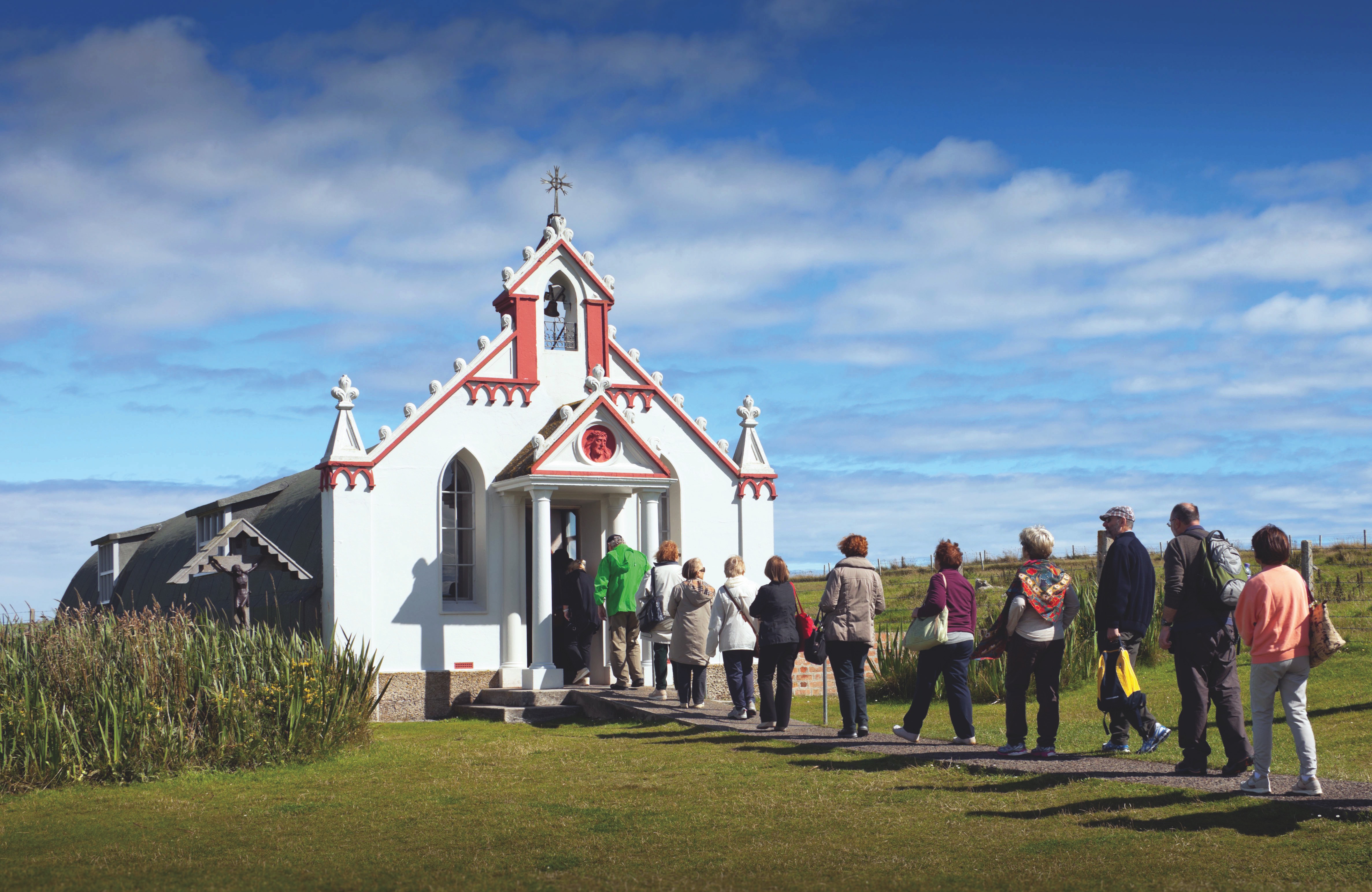 Visitors queuing up to enter the Italian chapel in Orkney, Scotland