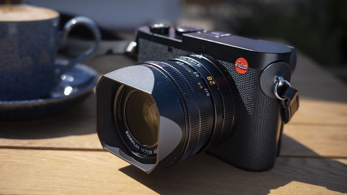 Leica Q3 camera on a wooden table