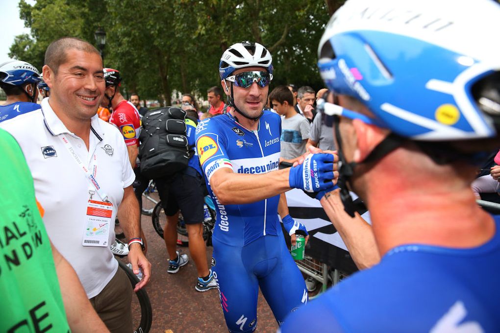 Elia Viviani celebrates after winning the 2019 RideLondon podium