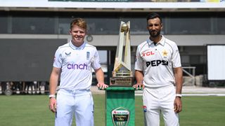 England captain Ollie Pope (l) and Pakistan captain Shan Masood with the series trophy ahead of the First Test Match at Multan Cricket Stadium on October 06, 2024 in Multan, Pakistan.