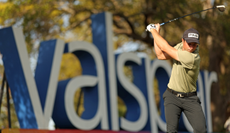 Viktor Hovland at the top of his backswing