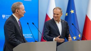 Poland's Prime Minister Donald Tusk (R) and Microsoft's Vice Chair and President Brad Smith (L) a joint press conference in the government building in Warsaw, Poland, on February 17, 2025.