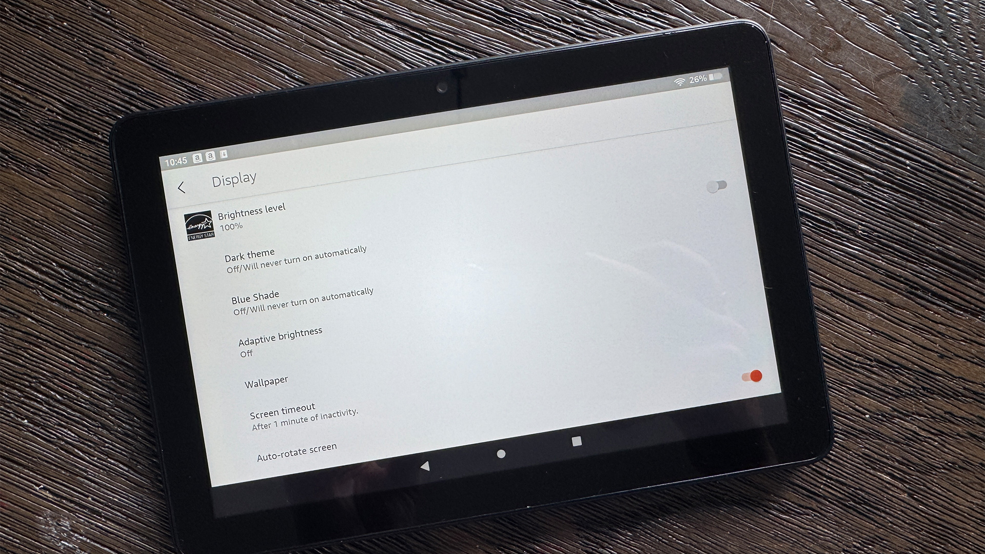 Amazon Fire HD 8 tablet on wooden surface