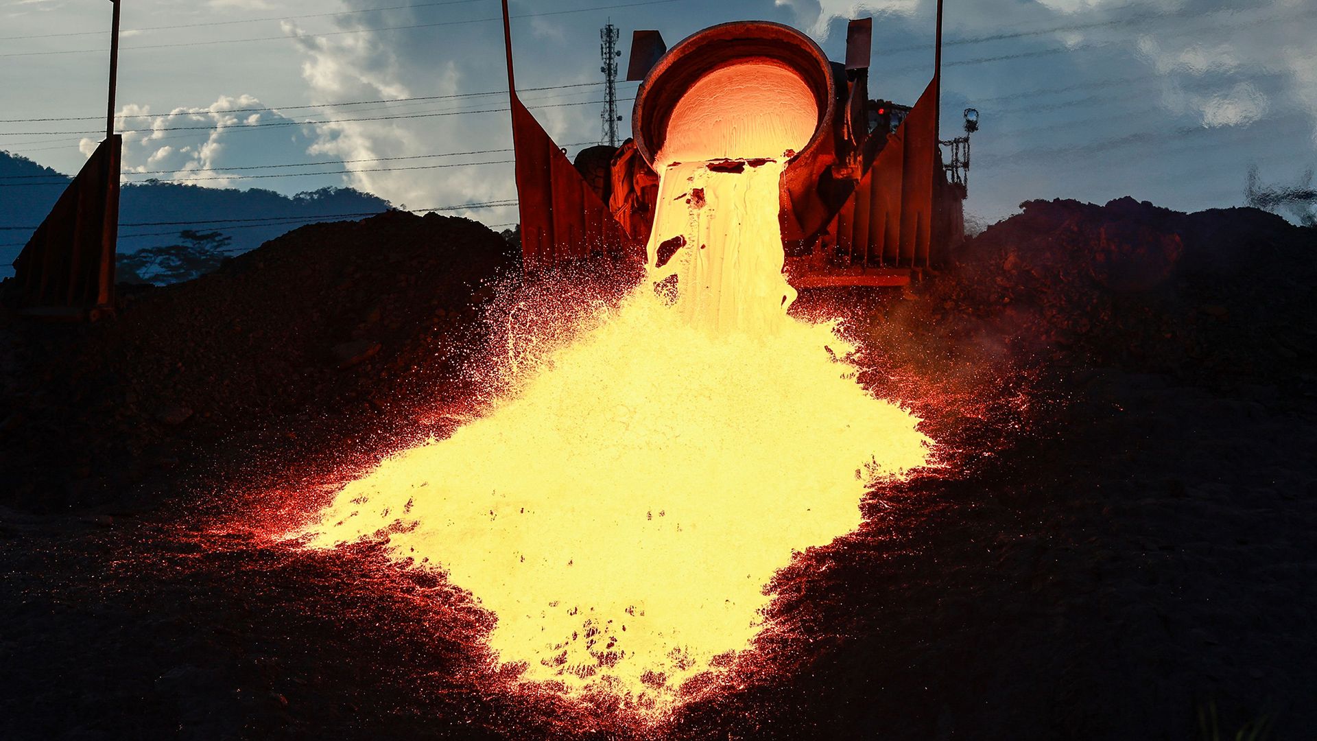 
                                Molten slag flows from a container truck at a nickel processing site in Sorowako, South Sulawesi, Indonesia
                            