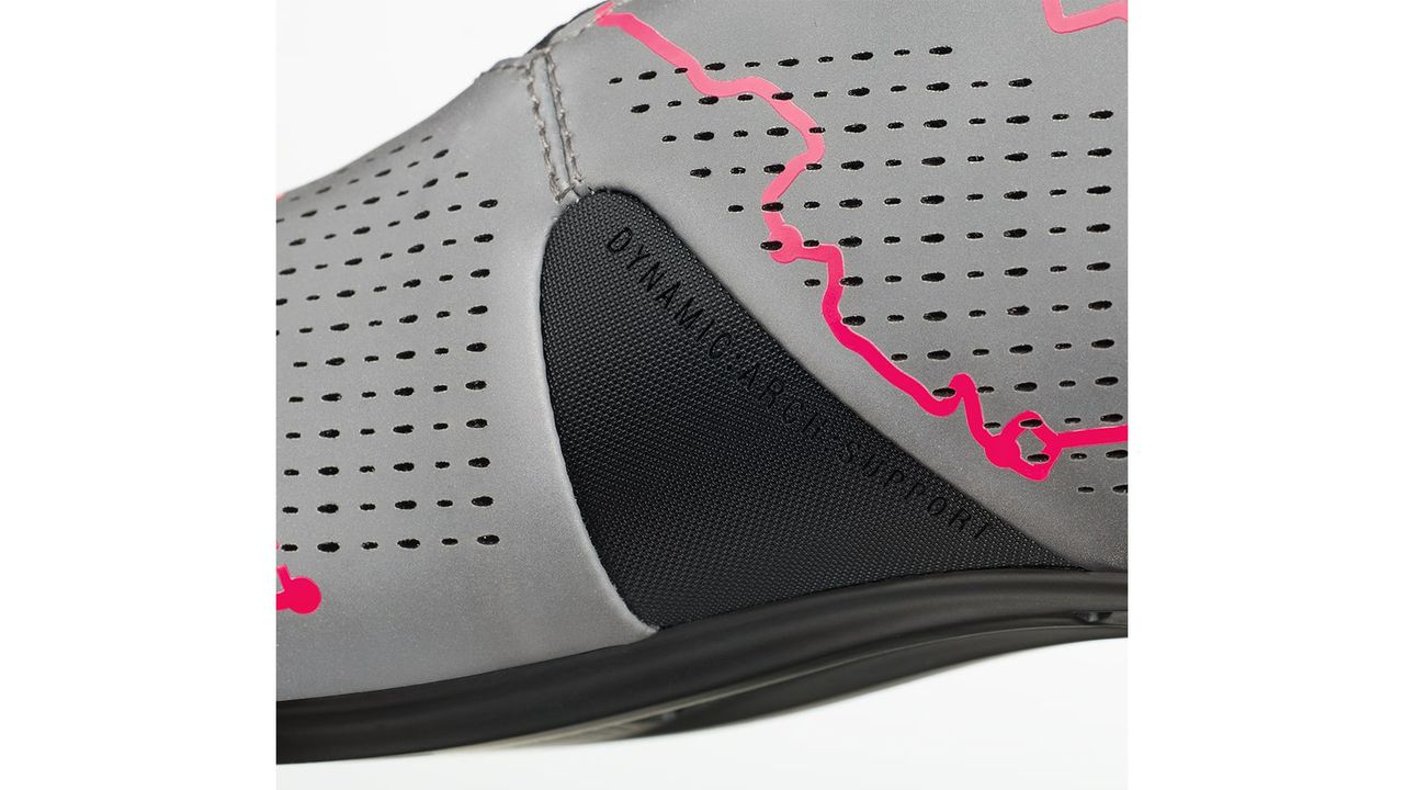 A reflective outer is detailed with pink, showcasing the routes from 1919 and 2019