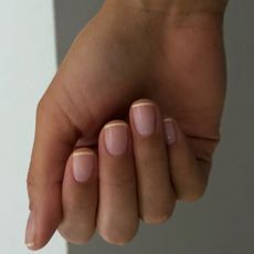 A butter yellow French tip manicure