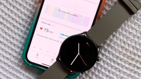 Image shows an Amazfit GTR 3 watch resting on a phone.