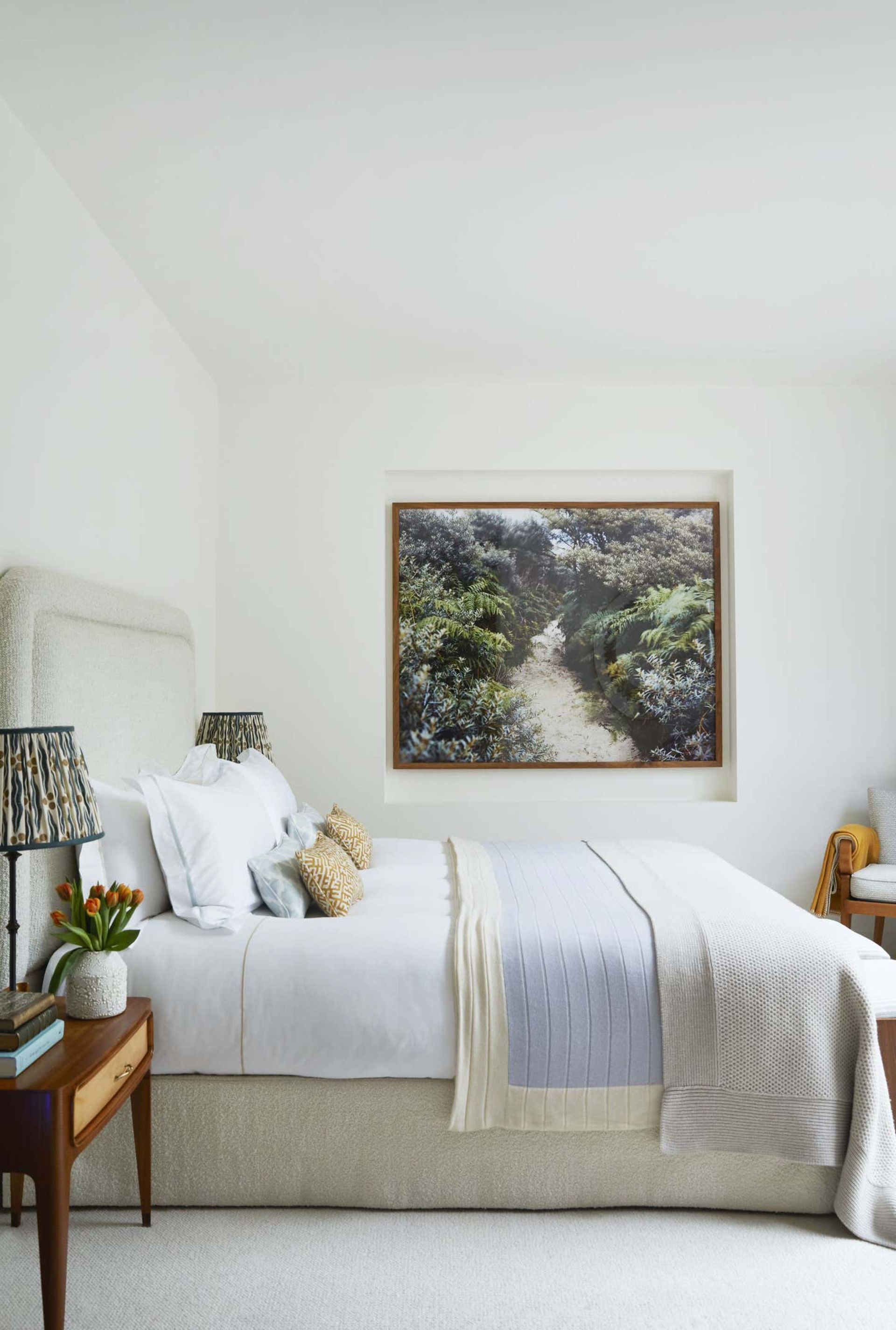 How can I make my bedroom feel like a hotel?