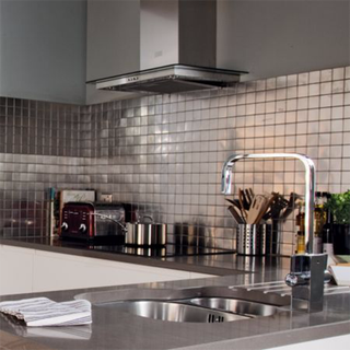 Silver kitchen counter with silver stainless steel mosaic tile sheet