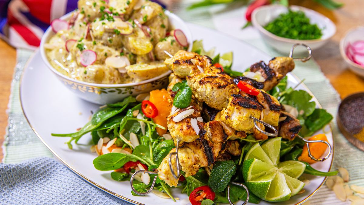 Ainsley's coronation kebabs with spiced potatoes and mango salad from Ainsley's Coronation Kitchen