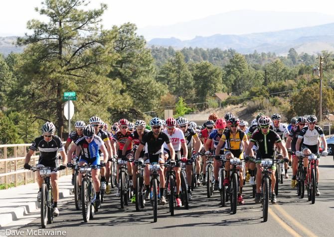 The pro men ride tempo up the six-mile road climb