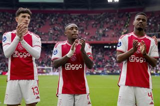 Ajax players applaud their fans after a game against FC Twente in April 2024.