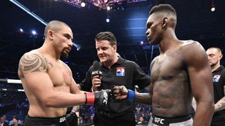 Israel Adesanya and Robert Whittaker before their fight at UFC 243
