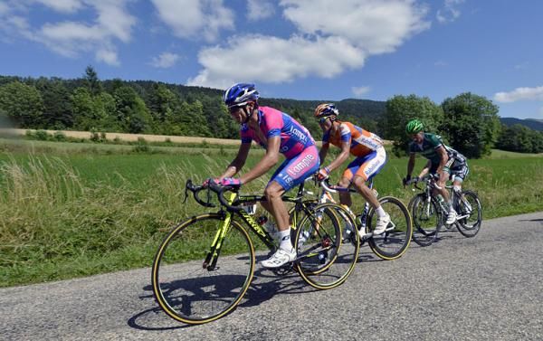 Michele Scarponi (Lampre-ISD), Luis Leon Sanchez (Rabobank), Thomas Voeckler (Europcar) and Dries Devenyns (Omega Pharma-QuickStep) in the lead during the finale of stage 10.
