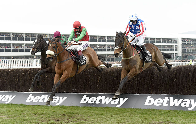 Dodging Bullets 1st leads Special Tiara 3rd,(rt) and Sommersby 2nd (left) over the last in the Queen Mother Champion Chase 11-3-15