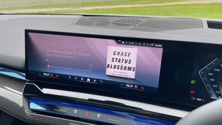 BMW Curved Display with album art in the BMW 5 Series