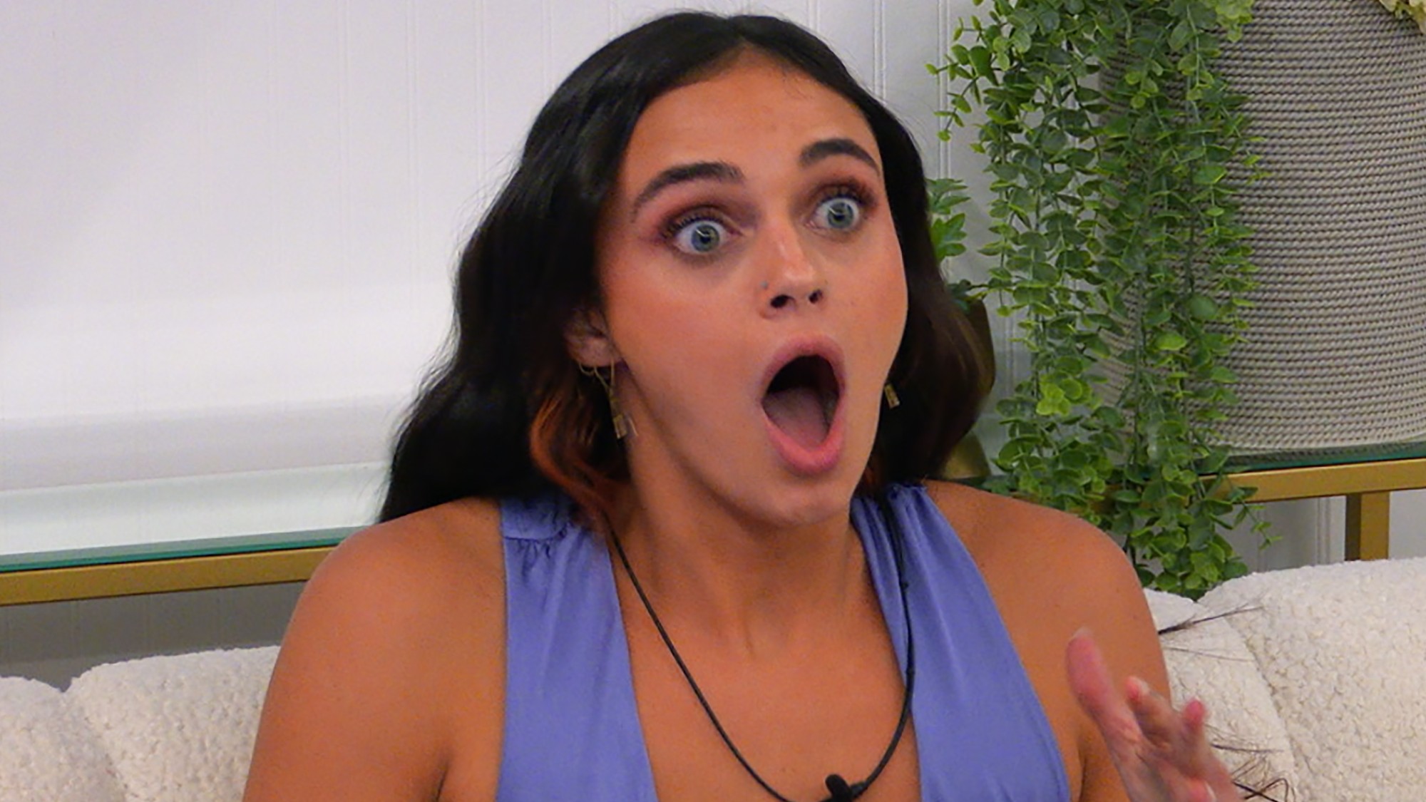 Madelyn reacting with surprise in her room on The Circle