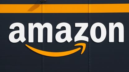The logo of Amazon is seen on the facade of the company logistics center on April 21, 2020 in Bretigny-sur-Orge, France.