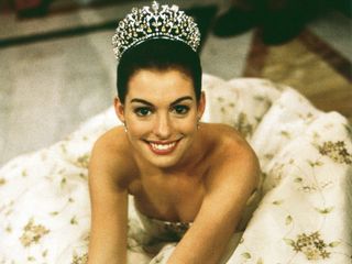 Anne Hathaway poses in a tiara for The Princess Diaries.