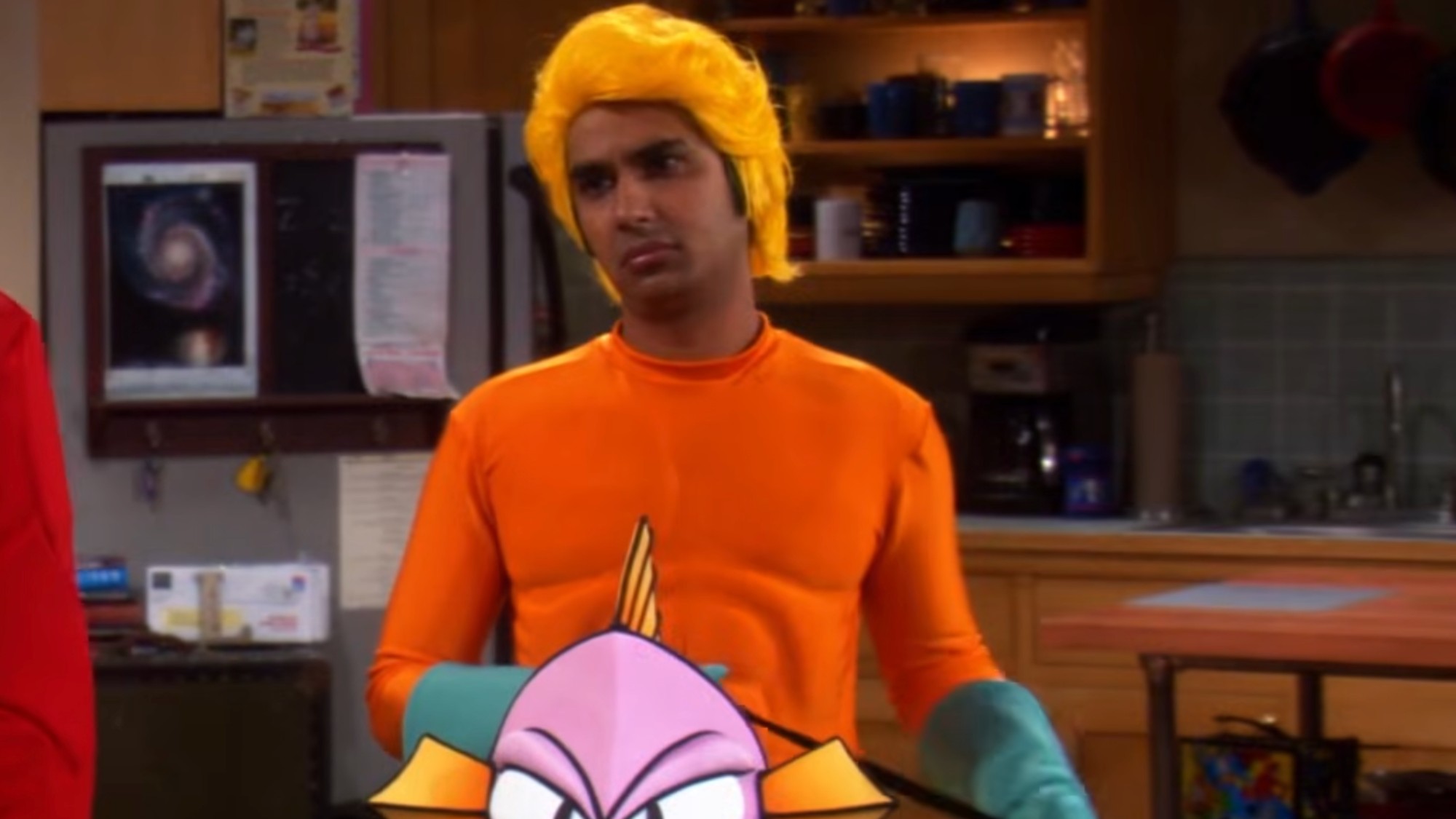 Raj dressed as Aquaman. 