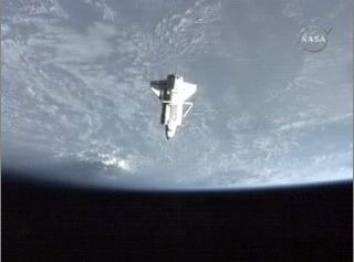 Shuttle Discovery Undocks From Space Station