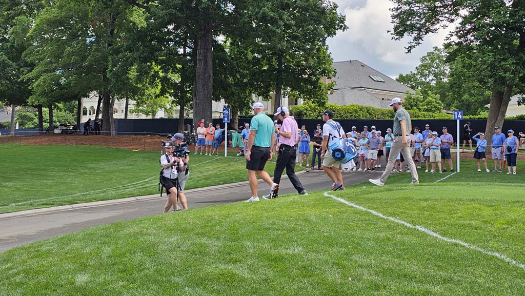 A CBS camera operator uses a roaming Steadicam to follow the golfers at the 2025 PGA Championship.