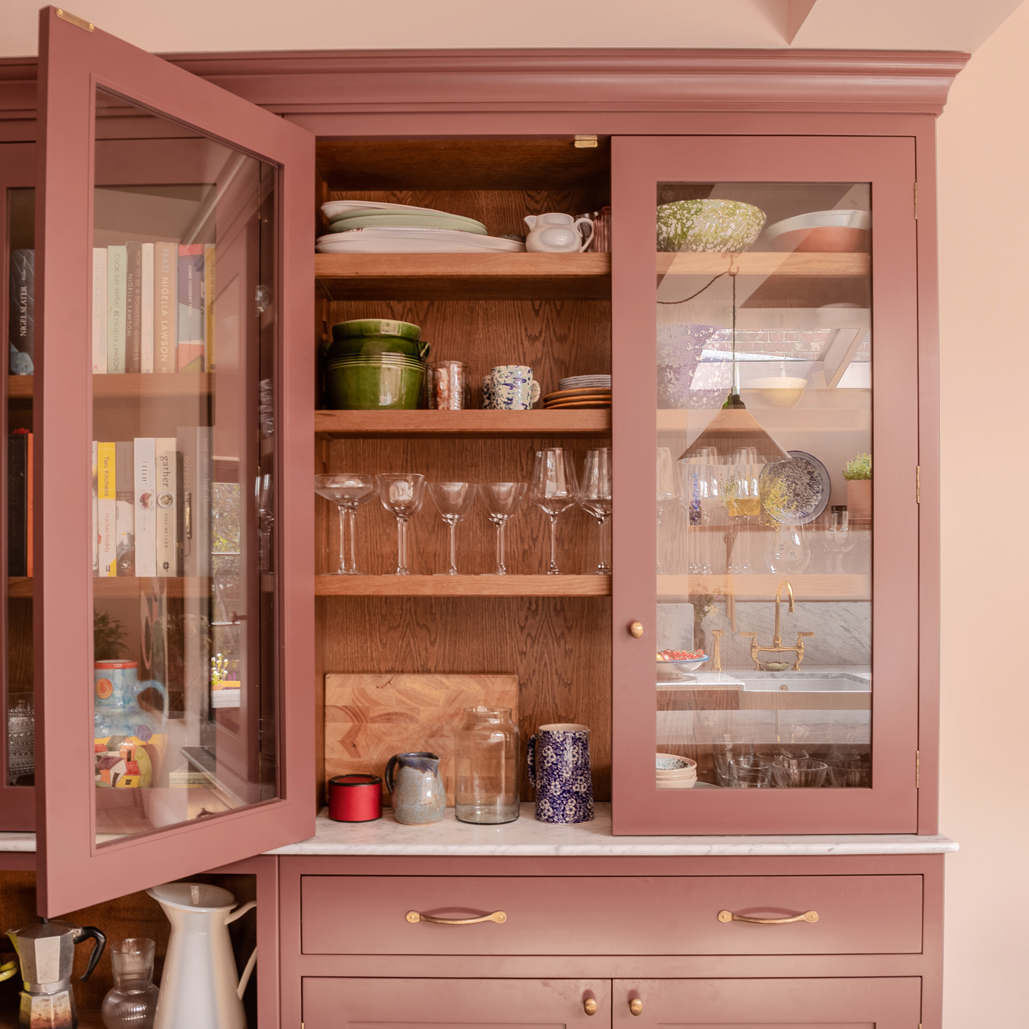 purple kitchen dresser with grazed front with shelving and drawers underneath