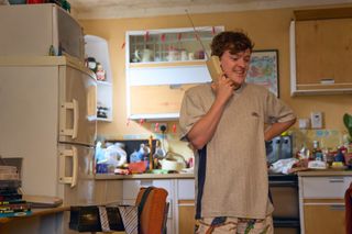  Jonny Weldon as Ian on the phone in One Day 