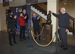 (From left) Lilla Merabet, vice president of the Grand Est region in France, and European Space Agency astronauts Helen Sharman, Paolo Nespoli and Reinhold Ewald cheer as Philippe Jung, chairman of the History Council of the Aeronautical and Astronautical Association, pets Félicette's new memorial statue at the International Space University in Strasbourg, France, on Dec. 18, 2019.