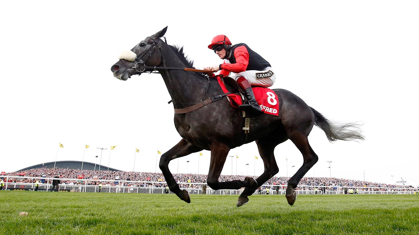 LIVERPOOL, ENGLAND - APRIL 10: Sam Twiston-Davies riding Saphir du Rheu clears the last to win the Betfred Mildmay Novices' Chase at Aintree Racecourse on April 10, 2015 in Liverpool, England. (Photo by Clive Rose/Getty Images) Aintree Races