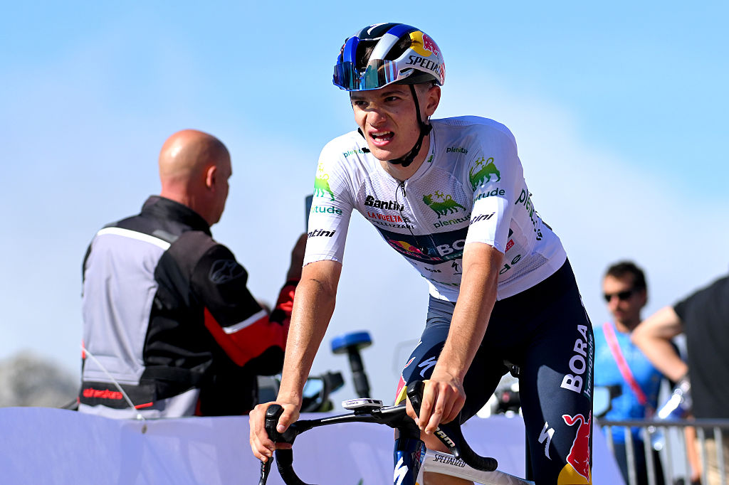 L'ANGLIRU, SPAIN - SEPTEMBER 05: Giulio Pellizzari of Italy and Team Red Bull - BORA - hansgrohe - White Best Young Rider Jersey crosses the finish line during the La Vuelta - 80th Tour of Spain 2025, Stage 13 a 203.7km stage from Cabezon de la Sal to L'Angliru 1556m / #UCIWT / on September 05, 2025 in L'Angliru, Spain. (Photo by Tim de Waele/Getty Images)