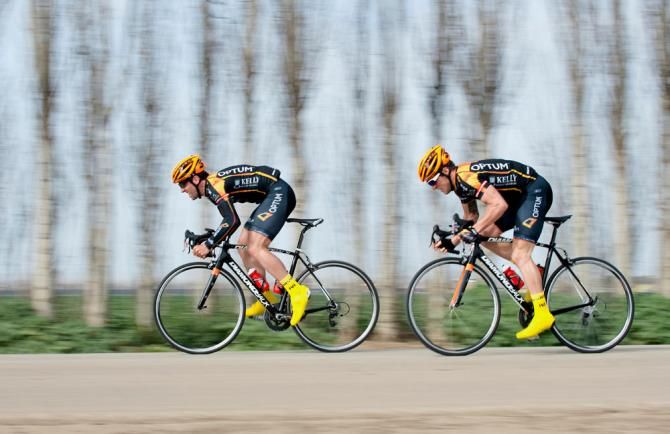 Sprinters Eric Young and Brad Huff flash by in a series of two up sprints.
