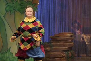 Justin Fletcher, aka Mr Tumble, in The Tempest and reading a story