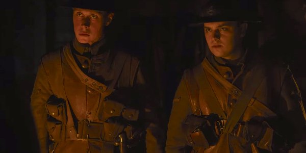 1917 soldiers awaiting orders in a candlelit room