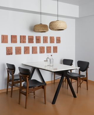 A small dining with sleek, clean designed furniture