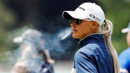 Charley Hull smoking a cigarette during the 2024 US Women's Open