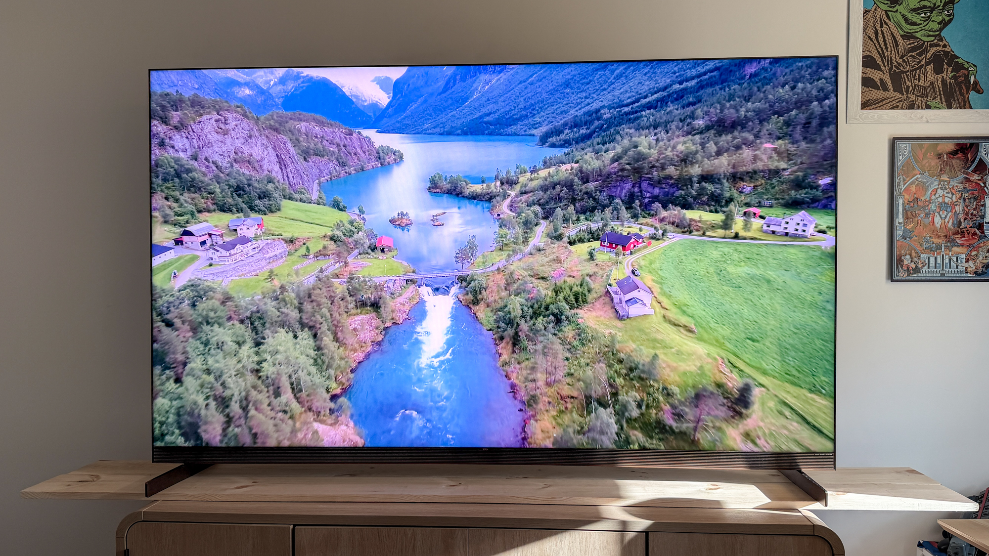 TCL X11L SQD Mini-LED TV on a side table