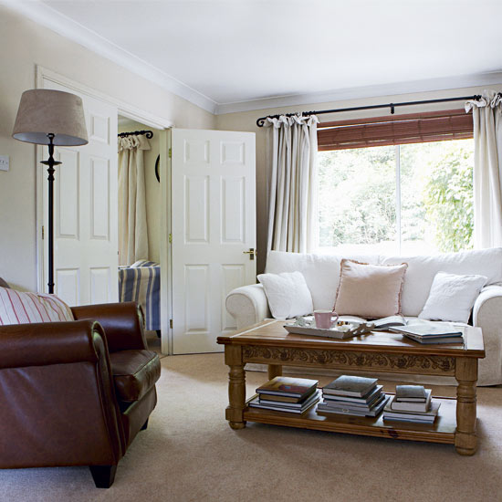 living room with door and sofa