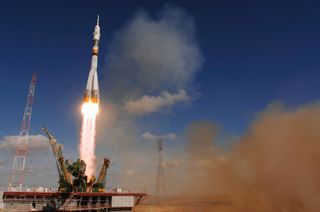 The Soyuz TMA-13 spacecraft launches from the Baikonur Cosmodrome