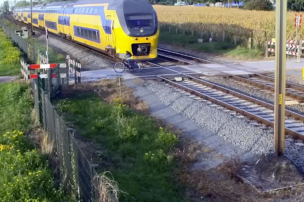 Dutch Cyclist Comes Within Inches Of Being Hit By Train At Level Crossing Cycling Weekly