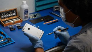 An iPhone being repaired