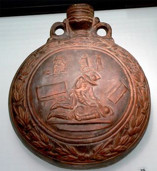 This flask shows a Murmillo who has just defeated a Thraex gladiator.