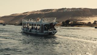 Passenger ferry along the Nile at first light