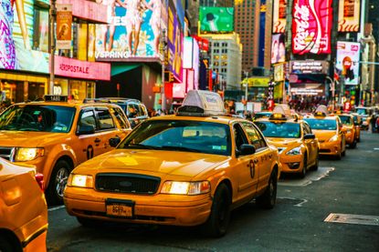 Taxis on 7th Avenue at Times Square, New York City.