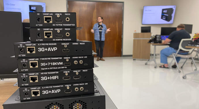 Just Add Power devices on display in front of a teacher in a certification program.