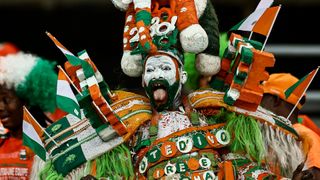 Ivory Coast fan dressed up in national colours at AFCON
