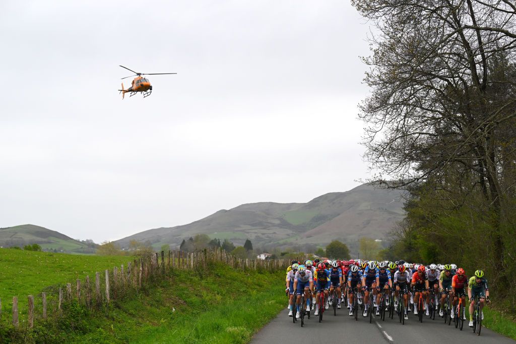 KANBO FRANCE APRIL 02 LR Fabien Grellier of France and Team TotalEnergies Julien Bernard of France and Team Lidl Trek Pieter Serry of Belgium and Team Soudal QuickStep Emanuel Buchmann of Germany and Team BORA hansgrohe Michal Kwiatkowski of Poland and Team INEOS Grenadiers Bob Jungels of Luxembourg and Team BORA hansgrohe Brandon Smith Rivera of Colombia and Team INEOS Grenadiers and Roger Adria of Spain and Team BORA hansgrohe lead the peloton during the 63rd Itzulia Basque Country 2024 Stage 2 a 160km stage from Irun to Kanbo UCIWWT on April 02 2024 in Kanbo France Photo by Tim de WaeleGetty Images